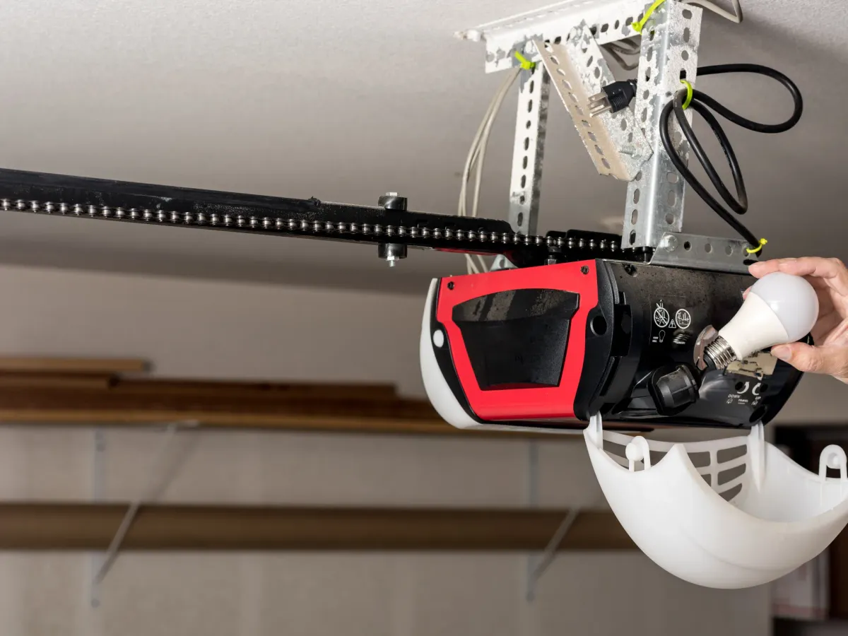 Power drill near garage door hardware