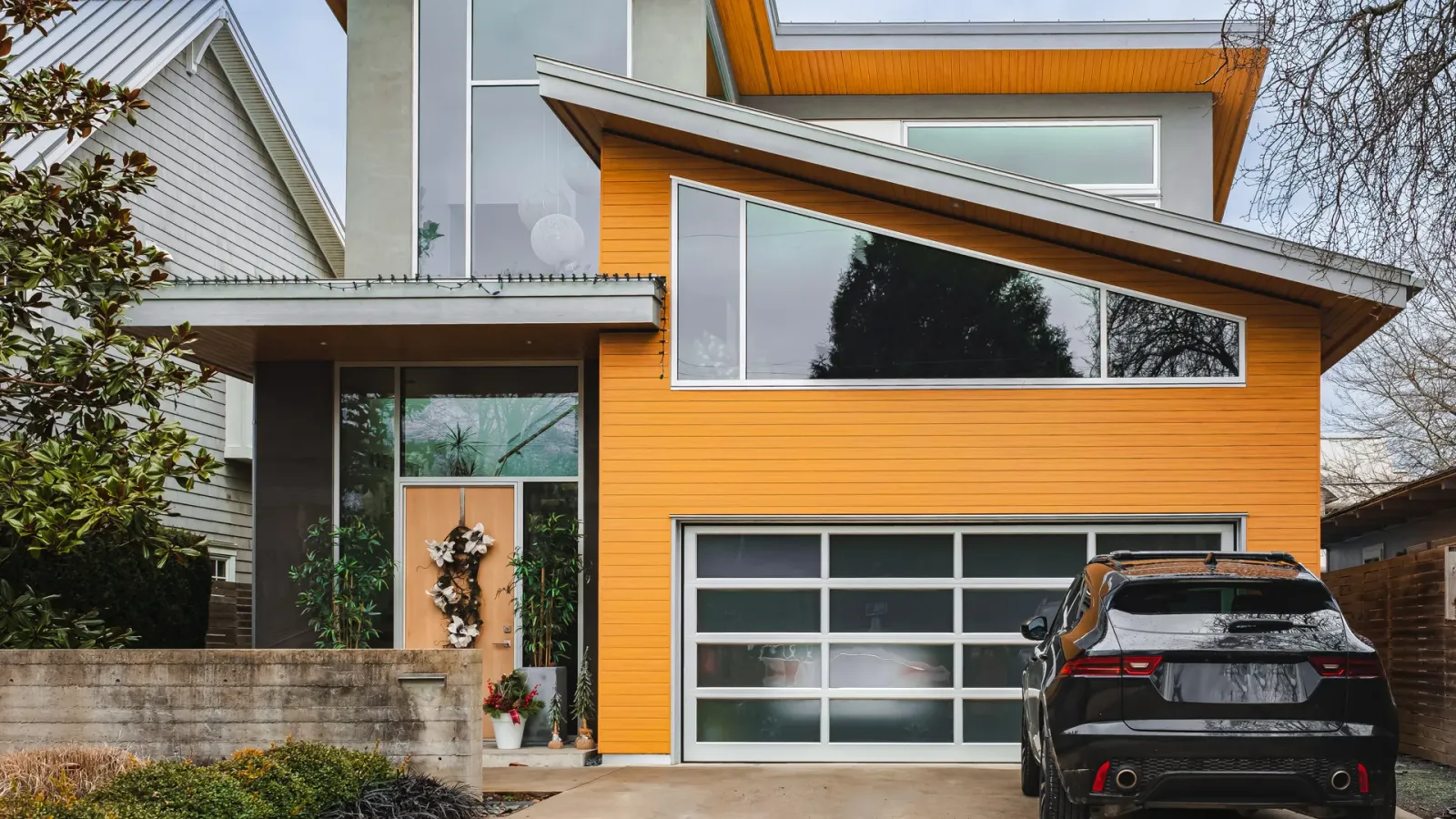 Modern home exterior with a residential garage door