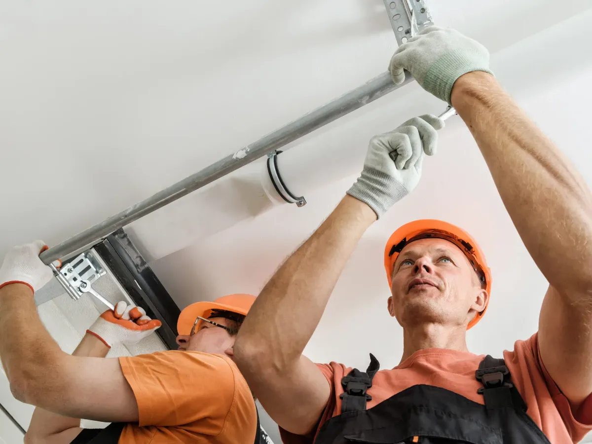 Overhead view of a garage door repair in progress