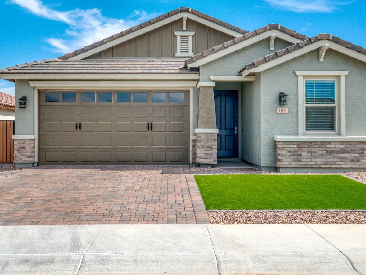 Residential garage door installation on a home exterior